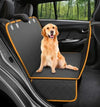 Golden retriever sitting on a premium pet seat cover in a car, providing comfort and protection.